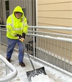 Public Works shoveling snow